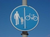 Cartello stradale genitore e figlia